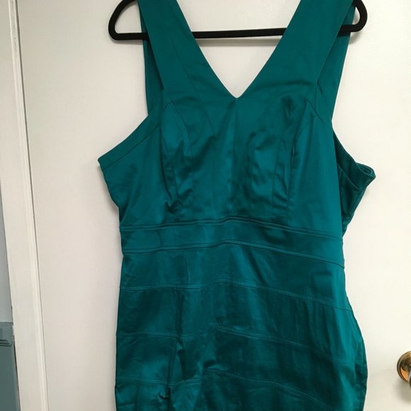 Ricki's Dresses & Skirts - Satiny Turquoise bandage-style dress